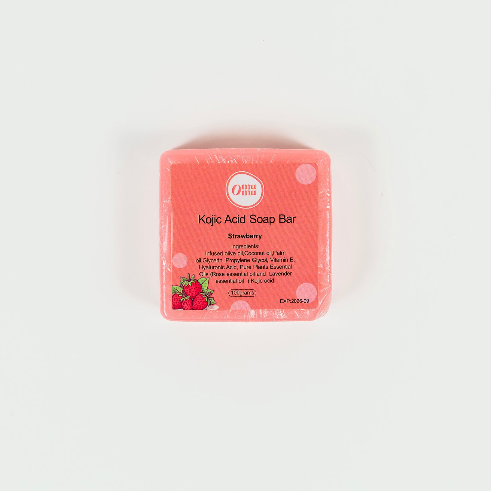 Introducing the Kojic Acid Soap Bar - Strawberry by Omumu. This luxurious soap is infused with nourishing ingredients like olive oil, coconut oil, palm oil, and hyaluronic acid, delivering deep hydration while promoting a brighter complexion. Enhanced with the fresh scent of strawberry and enriched with Kojic acid, this soap gently exfoliates and helps reduce the appearance of dark spots, leaving your skin smoother and more radiant. Perfect for everyday use, it also features pure plant essential oils, inclu